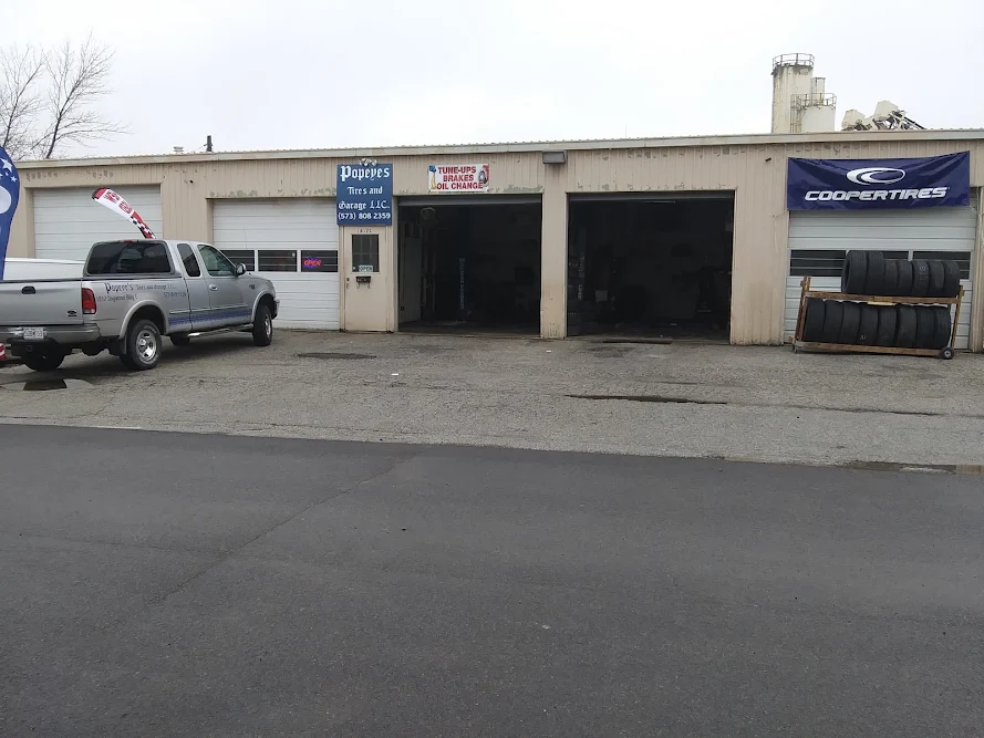 Popeyes garage and auto sales, buy here pay here car dealer in Columbia, MO